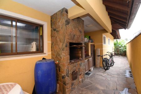Casa de condomínio à venda com 200m², 4 quartos e 2 vagasÁrea com Churrasqueira