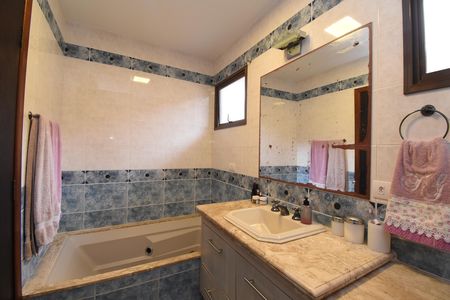 Casa de condomínio à venda com 200m², 4 quartos e 2 vagasBanheiro da Suíte