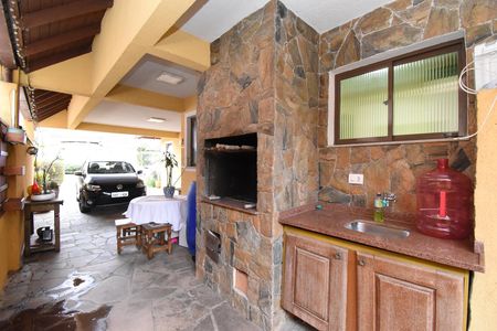 Casa de condomínio à venda com 200m², 4 quartos e 2 vagasÁrea com Churrasqueira