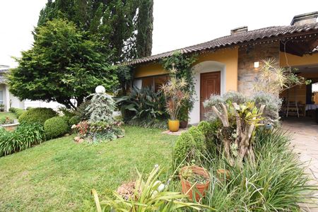 Casa de condomínio à venda com 200m², 4 quartos e 2 vagasÁrea externa - Frente