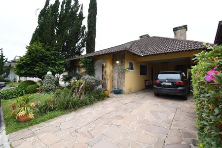 Casa de condomínio à venda com 200m², 4 quartos e 2 vagasÁrea externa - Frente