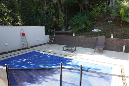 Casa de condomínio à venda com 390m², 4 quartos e 4 vagasPiscina