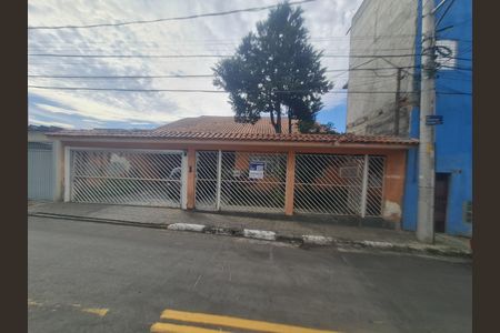 Fachada com placa QuintoAndar de casa à venda com 4 quartos, 420m² em Jardim Dourado, Guarulhos