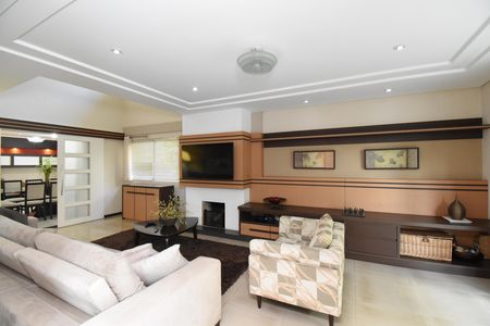 Casa de condomínio para alugar com 346m², 4 quartos e 4 vagasSala de Estar