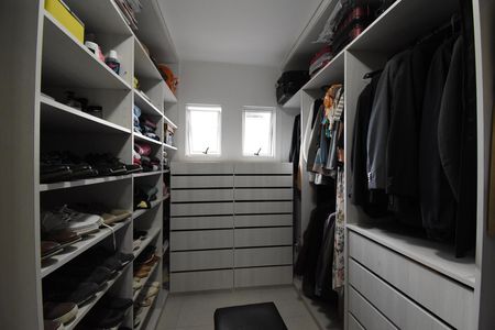 Casa de condomínio para alugar com 346m², 4 quartos e 4 vagasCloset da Suíte 3