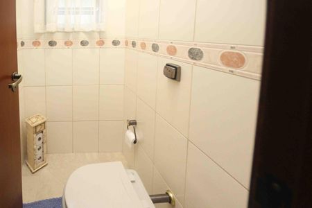 Casa à venda com 260m², 4 quartos e 4 vagas Casa à venda com 260m², 4 quartos e 4 vagasLavabo
