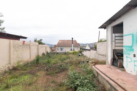 Quintal de casa à venda com 3 quartos, 160m² em Santo Antônio, Porto Alegre