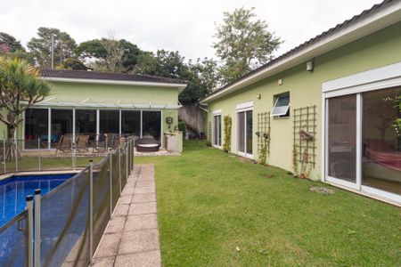 Casa de condomínio para alugar com 460m², 4 quartos e 3 vagasQuintal
