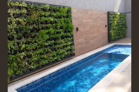 Foto 01 de casa de condomínio à venda com 4 quartos, 275m² em Alphaville, Barueri