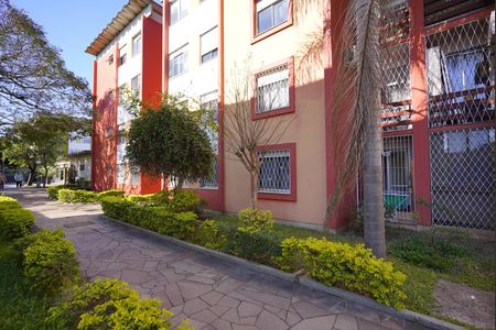 Fachada do bloco de apartamento à venda com 2 quartos, 55m² em Vila Nova, Porto Alegre