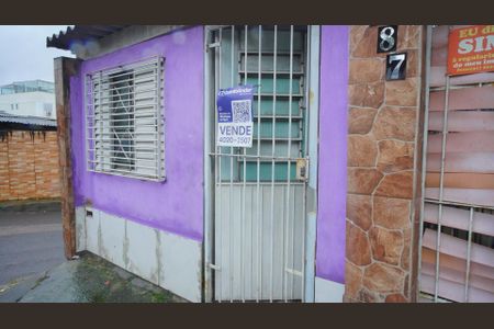 Fachada e placa  de casa à venda com 1 quarto, 30m² em Passo das Pedras, Porto Alegre