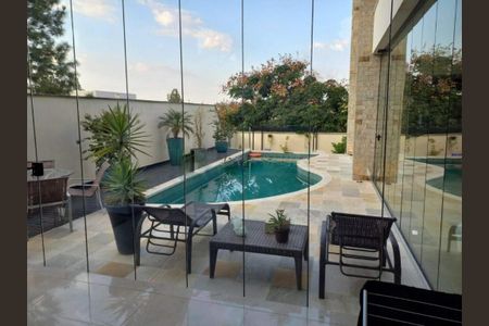 Casa de condomínio à venda com 472m², 5 quartos e 4 vagas