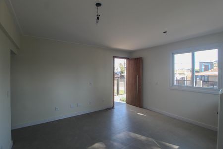 Sala de casa para alugar com 3 quartos, 70m² em Guarujá, Porto Alegre
