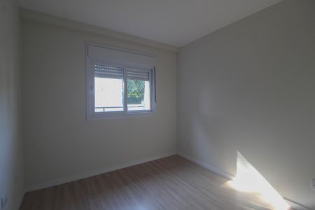 Quarto 3 de casa para alugar com 3 quartos, 70m² em Guarujá, Porto Alegre