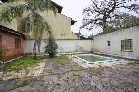Pátio e piscina de casa à venda com 4 quartos, 450m² em Tristeza, Porto Alegre