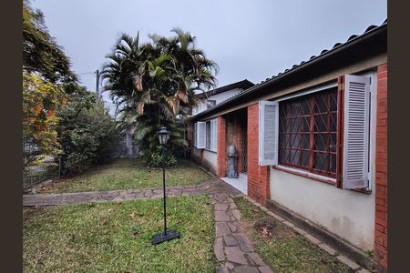 Frente da casa de casa à venda com 4 quartos, 450m² em Tristeza, Porto Alegre