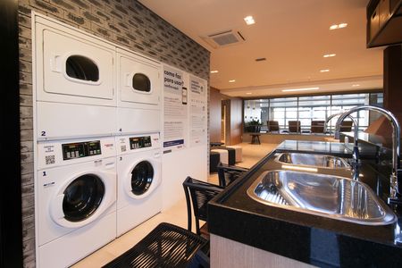 Studio à venda com 27m², 1 quarto e 1 vaga Studio à venda com 27m², 1 quarto e 1 vagaLavanderia