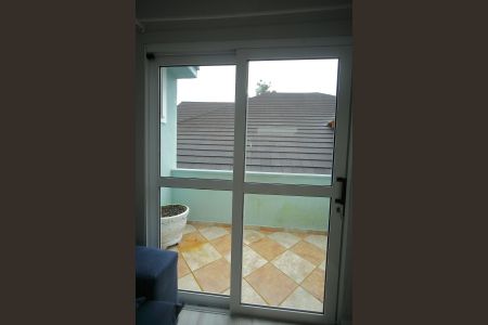 Casa de condomínio para alugar com 420m², 4 quartos e 6 vagasVaranda Sala de TV 