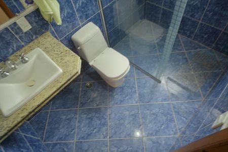 Casa de condomínio para alugar com 420m², 4 quartos e 6 vagasBanheiro Suíte 4 