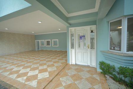 Casa de condomínio para alugar com 420m², 4 quartos e 6 vagasGaragem/Fachada 
