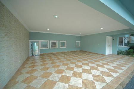 Casa de condomínio para alugar com 420m², 4 quartos e 6 vagasGaragem 