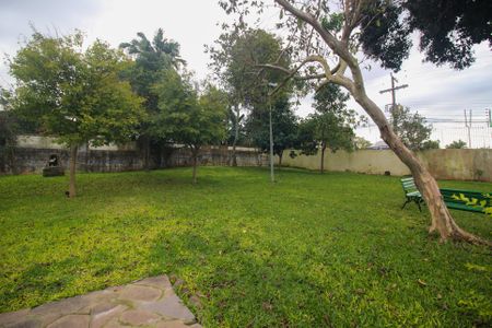 Área comum - jardim de casa de condomínio para alugar com 4 quartos, 122m² em Santo Antônio, Porto Alegre