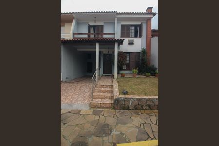 Fachada de casa de condomínio para alugar com 4 quartos, 122m² em Santo Antônio, Porto Alegre