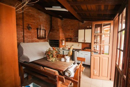 Varanda de casa de condomínio à venda com 4 quartos, 122m² em Santo Antônio, Porto Alegre