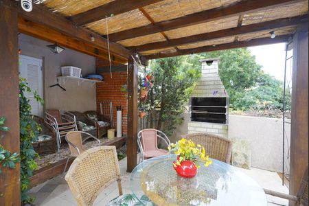 Varanda piscina  de casa à venda com 3 quartos, 400m² em Teresópolis, Porto Alegre