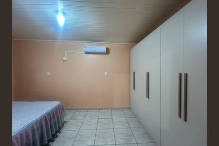 Quarto 1 de casa para alugar com 2 quartos, 70m² em Mathias Velho, Canoas