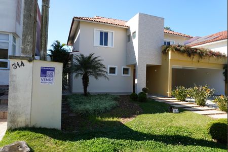 Casa de condomínio à venda com 313m², 4 quartos e 4 vagasFachada