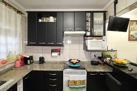 Casa à venda com 280m², 4 quartos e 4 vagasSala / Cozinha