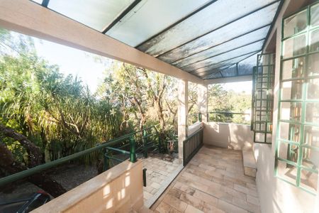 Casa de condomínio à venda com 430m², 4 quartos e 3 vagas Casa de condomínio à venda com 430m², 4 quartos e 3 vagascasa 1 - varanda sala