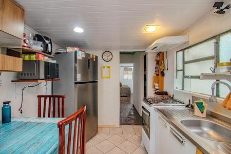 Cozinha de casa à venda com 2 quartos, 61m² em Farrapos, Porto Alegre