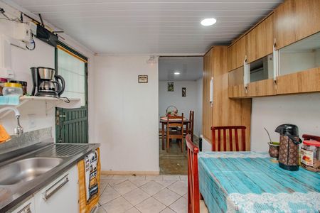 Casa à venda com 61m², 2 quartos e 2 vagas Casa à venda com 61m², 2 quartos e 2 vagasCozinha