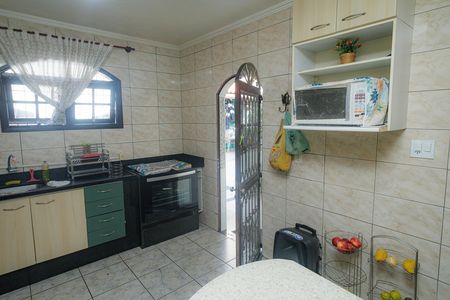 Casa à venda com 180m², 3 quartos e 2 vagas Casa à venda com 180m², 3 quartos e 2 vagasCozinha