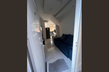 Sala de casa de condomínio para alugar com 2 quartos, 65m² em Balneario Japurá, Praia Grande