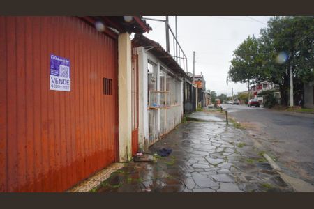 Fachada de casa à venda com 2 quartos, 110m² em Costa E Silva, Porto Alegre