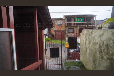 Vista da Rua de casa à venda com 2 quartos, 110m² em Costa E Silva, Porto Alegre