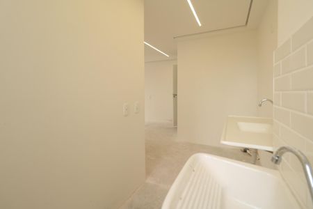 Apartamento à venda com 54m², 3 quartos e 1 vaga Apartamento à venda com 54m², 3 quartos e 1 vagaCozinha e Área de Serviço