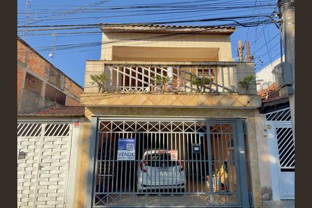 Placa instalada na fachada do imóvel  de casa à venda com 3 quartos, 125m² em Parque Continental Ii, Guarulhos