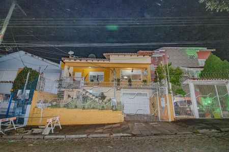 Fachada de casa à venda com 3 quartos, 302m² em Parque Santa Fé, Porto Alegre