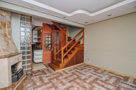 Sala de casa de condomínio para alugar com 3 quartos, 74m² em Humaitá, Porto Alegre