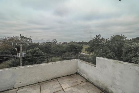 Varanda de casa à venda com 4 quartos, 218m² em Costa E Silva, Porto Alegre