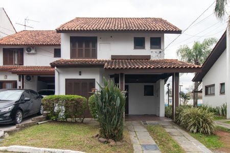Fachada de casa de condomínio para alugar com 3 quartos, 126m² em Cavalhada, Porto Alegre