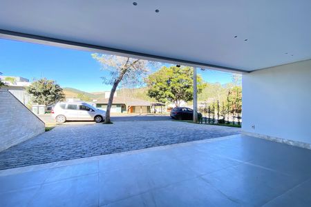 Garagem de casa de condomínio à venda com 5 quartos, 564m² em Alphaville Nova Lima, Nova Lima