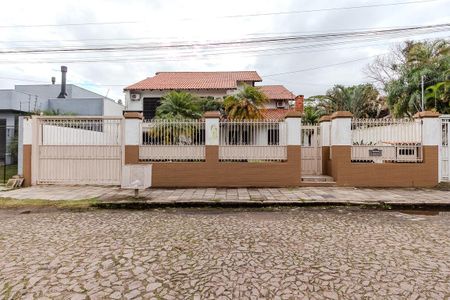 Fachada de casa à venda com 5 quartos, 480m² em Ipanema, Porto Alegre