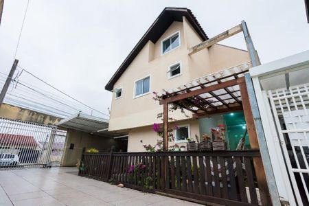 Fachada de casa de condomínio à venda com 4 quartos, 120m² em Uberaba, Curitiba
