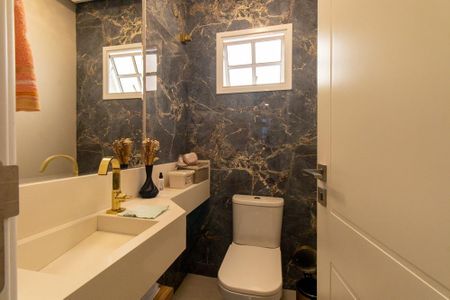 Casa de condomínio à venda com 320m², 3 quartos e 4 vagas Casa de condomínio à venda com 320m², 3 quartos e 4 vagasLavabo 1