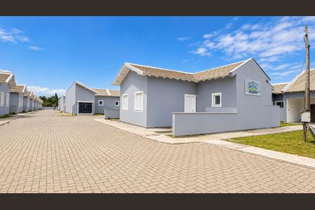 Fachada de casa de condomínio para alugar com 2 quartos, 42m² em Novo Mundo, Gravataí